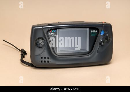 Pavia, Lombardy, Italy - December 27, 2024: Sega Game Gear Portable Video Game System from 1990 at Ctrl+Alt Museum. Code name: Project Mercury. Produc Stock Photo