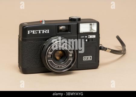 Pavia, Lombardy, Italy - December 27, 2024: Petri EF35 35mm Camera from 1954 at Ctrl+Alt Museum. By a Japanese camera manufacturer, it had a plastic v Stock Photo