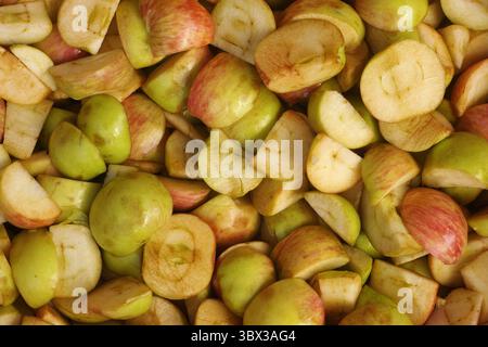 A background of sliced organic apples. Close up. Stock Photo