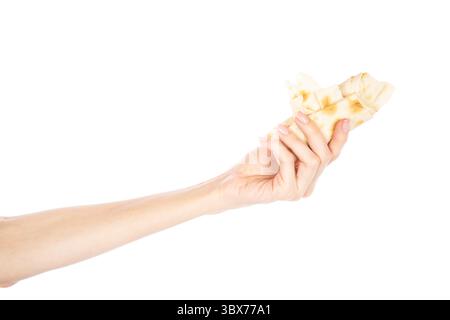Pita bread in female hand isolated on white background. Woman holding pita in her hand. Stock Photo