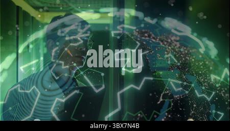 Studying holographic globe, Korean man in sweater operating in lab, with particles, copy space Stock Photo