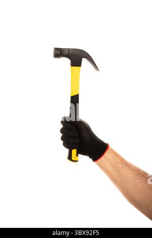 Man's hand in construction glove holding yellow hammer isolated on white background. Stock Photo