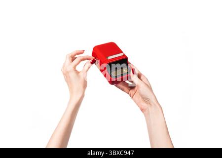 Small red printer for printing labels isolated on white background. Stock Photo
