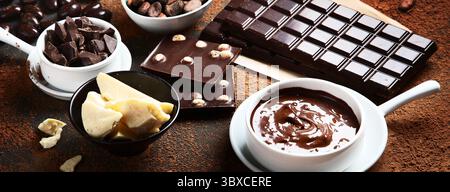 Dark chocolate bar,chocolate pieces and cocoa beans, cocoa powder. Panorama, banner Stock Photo