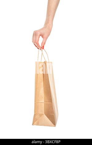 hand holding brown paper box package isolated on white background Stock ...