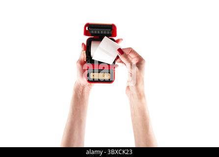 Small red printer for printing labels isolated on white background. Stock Photo