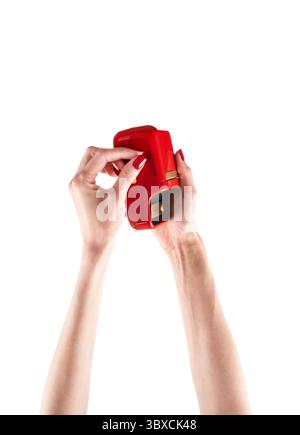 Small red printer for printing labels isolated on white background. Stock Photo