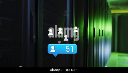 Displaying blue notification bubble pulsing on server racks in data center aisle, green LED lights Stock Photo