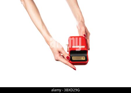 Small red printer for printing labels isolated on white background. Stock Photo