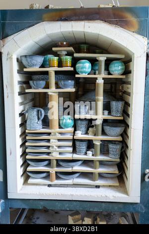 Artist in Ceramics and Pottery Studio working Stock Photo