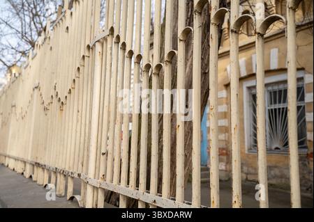 A close up of a fence in front of a building Stock Photo