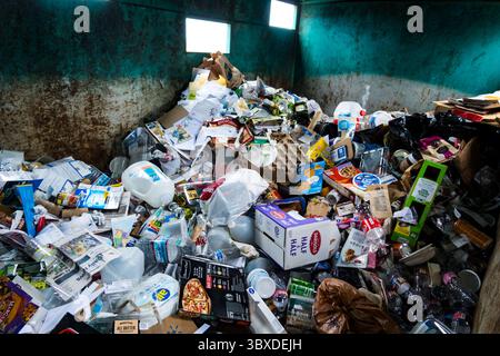 Plastic products in recycling bin Stock Photo