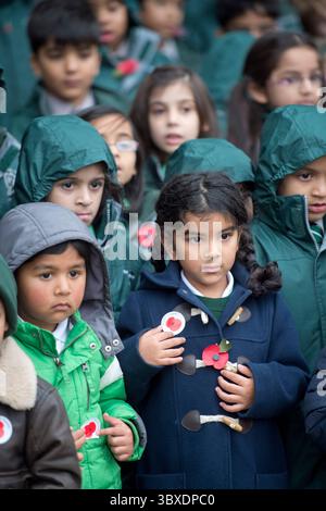 Nursery children a school's Remembrance Day two minutes silence, UK. Stock Photo
