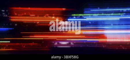 Abstract Rainbow light trails on the dark background Stock Photo