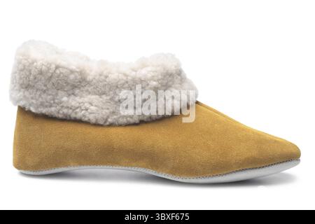Handcrafted leather slipper with wool lining on white background Stock Photo
