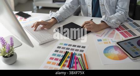 Asian woman graphic designer working in home office. Artist creative designer illustrator graphic skill concept Stock Photo