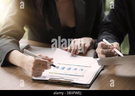 Close up Group of business people busy discussing financial matter during meeting. Corporate Organization Meeting Concept Stock Photo