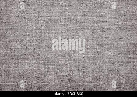 Natural linen fabric, background or texture, gray beige color, top view, close up, horizontal Stock Photo