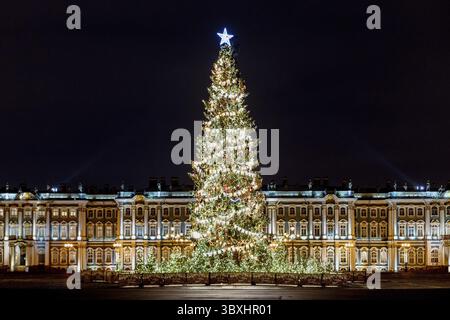 St. Petersburg, Russia - January 13, 2021: Traditional Christmas tree on Palace Square in St. Petersburg. Beautiful decorations, lights on main New Ye Stock Photo