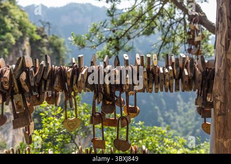 May 21, 2013, Zhanjiajie, Hunan Province, China: Traditional love locks signifying romantic relationships on bars in Zhangjiajie National Forest Park, Hunan, China. (Credit Image: © Jon G. Fuller/VW Pics via ZUMA Press Wire) Stock Photo
