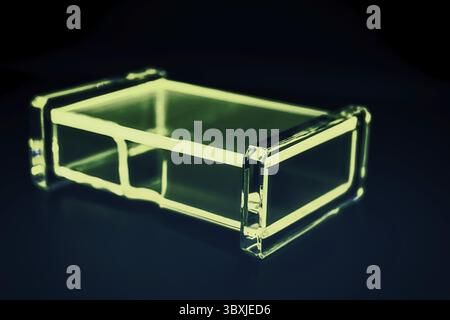 Abstract transparent plastic box dark background Stock Photo