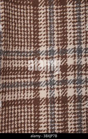 Classic tweed, Wool Background Texture. Coat close-up. Expensive suit fabric. Glenurquhart check is made of woolen fabric with a woven twill design of Stock Photo