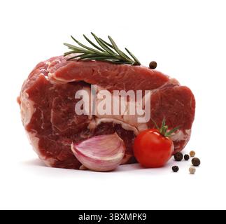 Huge raw ribeye steak garnished with spices, isolated Stock Photo