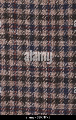 Classic tweed, Wool Background Texture. Coat close-up. Expensive suit fabric. Glenurquhart check is made of woolen fabric with a woven twill design of Stock Photo