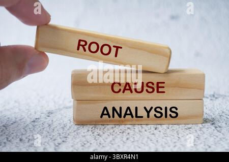 Root Cause Analysis text on wooden blocks. Business and problem analysis concept Stock Photo