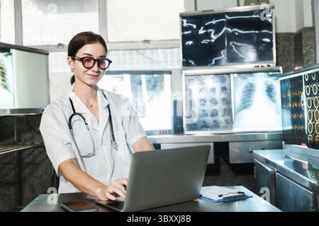 medical students studying brain disease diagnosis through learning from X-ray film in a laboratory Stock Photo