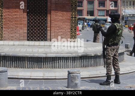 Indian security forces stand guard during the annual festival dedicated ...