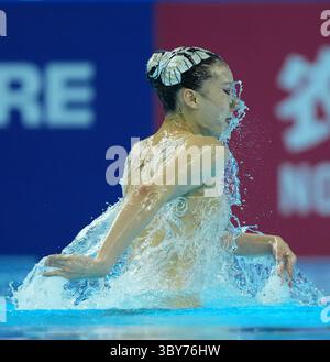 Singapore. 19th July, 2025. Xu Huiyan (C) of China celebrates with ...