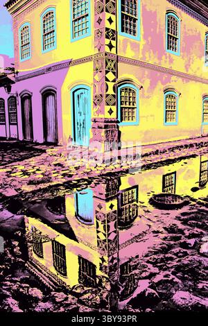 Old house reflected on puddle of water in cobblestone street at Paraty, a historic town totally preserved in Brazil. Blacklight Poster filter Stock Photo