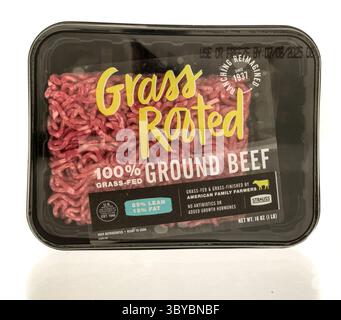 Winneconne, WI - 4 July 2025: A package Grass rooted ground beef on an isolated background. Stock Photo