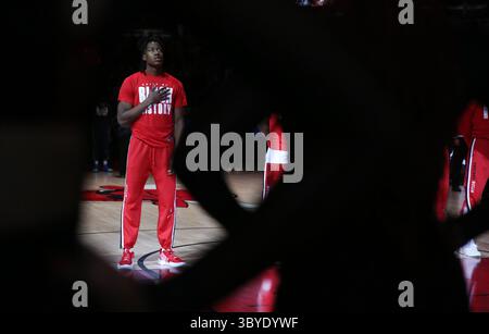 Minnesota Timberwolves guard Ayo Dosunmu, top, blocks a shot by ...