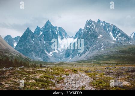 Rocky mountains in Lyngen Alps Norway landscape moody scenery travel beautiful destinations northern scandinavian wild nature, summer season valley an Stock Photo