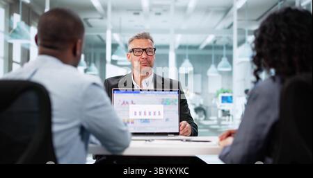 Financial Advisor Meeting With Client For Tax Planning Advice Depicts A Meeting Between An Accountant And Client Stock Photo