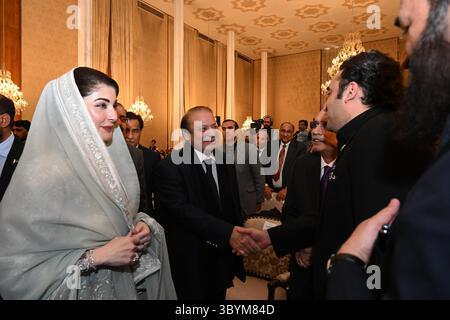 March 4, 2024, Islamabad, Pakistan: Islamabad (Pakistan), 04/03/2024.- A handout photo made available by the Pakistan People Party (PPP) shows Bilawal Bhutto Zardari (R) chairman of the PPP shaking hands with former Prime Minister Nawaz Sharif, during the oath taking ceremony of newly elected Prime Minister Shehbaz Sharif, in Islamabad, Pakistan, 04 March 2024. Lawmakers in Pakistan's National Assembly, the lower house of parliament, elected Shehbaz Sharif for a second term as prime minister amid protests from opposition members on 03 March. The Pakistan Tehrik-e-Insaf party of former Prime Mi Stock Photo