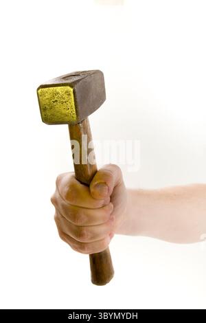 male hand hitting with sledge hammer isolated on white background Stock Photo