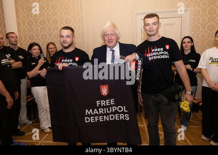 Boris Johnson, former UK Prime Minister meeting Ukrainian  war veterans at the Ukrainian Embassy in London. 18th July 2025 Stock Photo