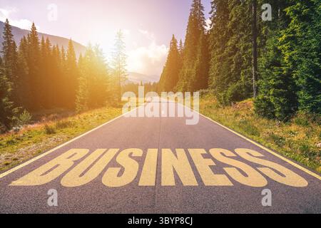 Business word written on road in the mountains Stock Photo