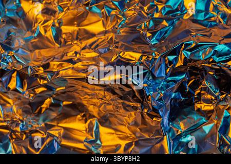 a spectrum of colours, from warm oranges and yellows to cool blues and teals, creating a dynamic and abstract composition. Stock Photo