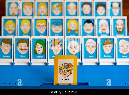 Amsterdam, The Netherlands, 16.07.2025, First-Person View of Classic “Guess Who?” Board Game Gameplay Stock Photo