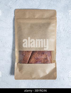 Dried plum fruit lavash in paper package Stock Photo