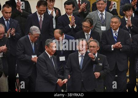 July 5, 2023, BEIJING, China: Beijing (China), 05/07/2023.- Chinese Premier Li Qiang (front R) gestures after attending a group photo session with Yohei Kono (front L), head of the Japanese Association for the Promotion of International Trade, and members of a Japanese delegations at the Great Hall of the People in Beijing, 05 July 2023. Others are not identified. (Japón) (Credit Image: © Andy Wong/POOL via ZUMA Press Wire) Stock Photo