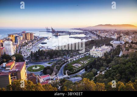 View over Malaga at sunset travel banner Stock Photo