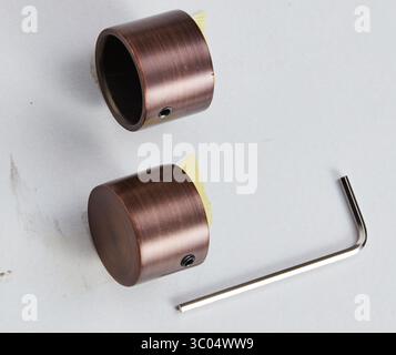 Round copper pipe with hexagon wrench isolated nature background with clipping path Stock Photo