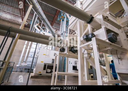 June 21, 2016 - Addis Ababa, Ethiopia - Addis Ababa, Ethiopia - Ethiopian male worker working on the mixing hopper machine at Oromia Coffee Farmers Cooperative. (Credit Image: © Edwin Remsberg / Vwpics/VW Pics via ZUMA Wire) Stock Photo