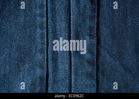 Blue Denim Texture with three Vertical Seam lines in the middle Stock Photo