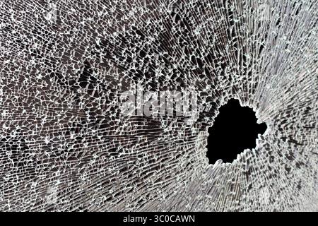 Broken rear window of a car. Glass only. Stock Photo
